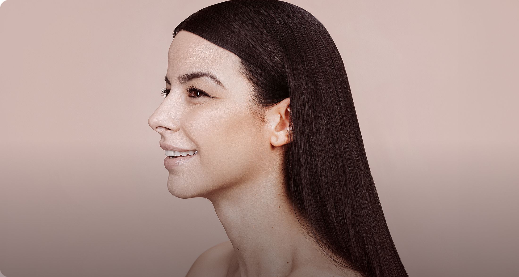 Denver plastic surgery model with sleek hair.