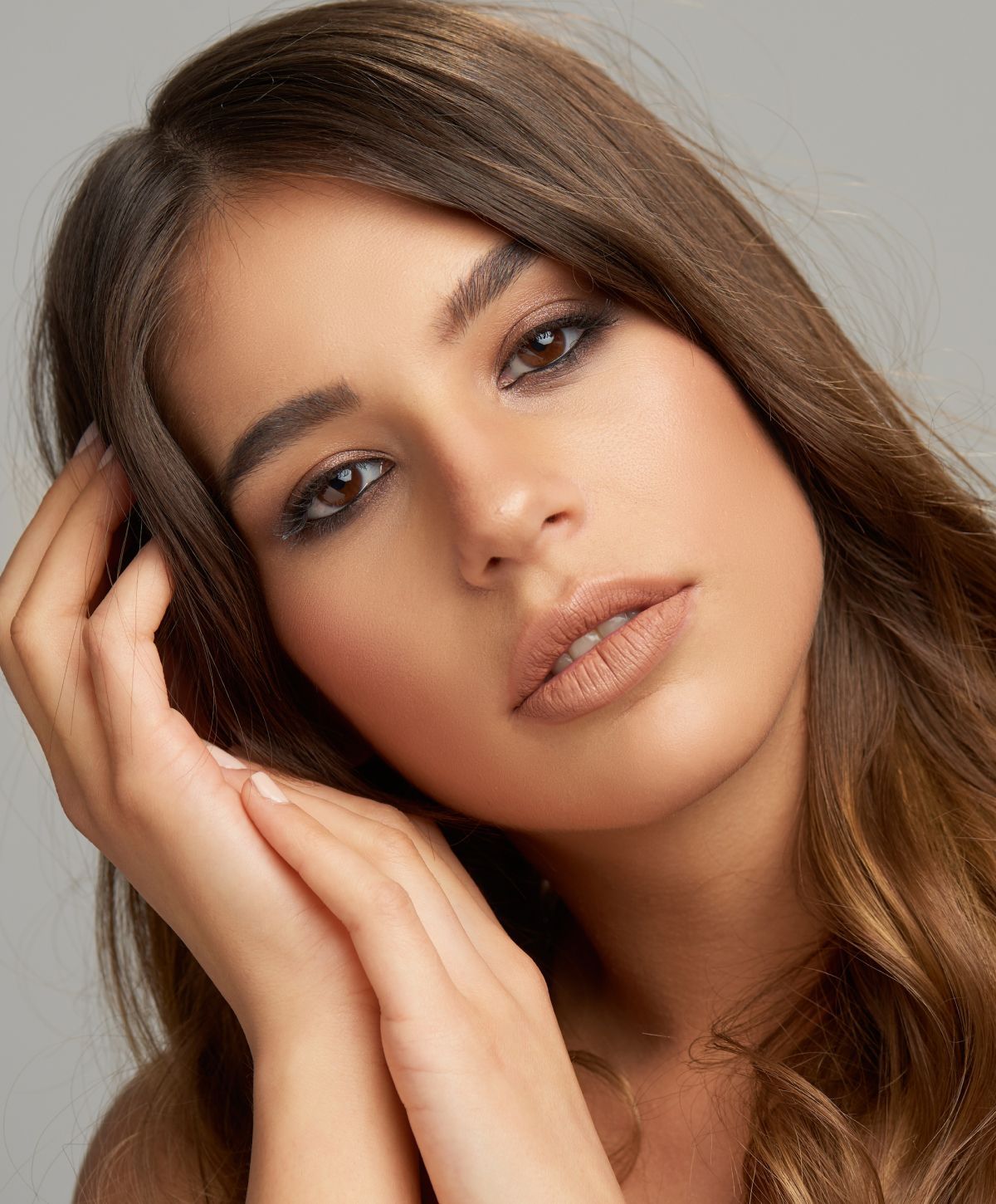 Close-up portrait of a woman with natural makeup.