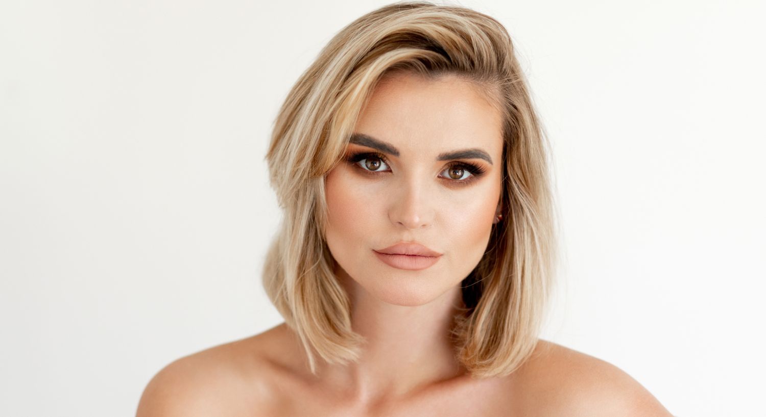 Denver Moxi Laser model with blonde hair and natural makeup.