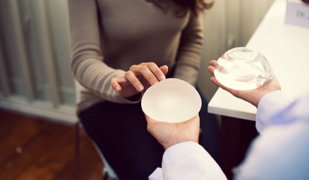Aedit Breast Implants 101: Your Guide To Type, Shape, Texture, And More featuring Dr. Buford